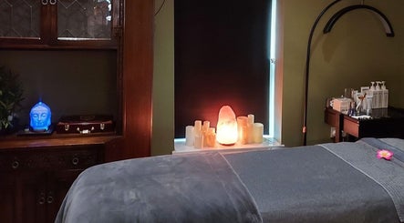 Relaxing spa room at The Escape Beauty Rooms, Abertillery, Wales, GB with Himalayan salt lamp and candles.