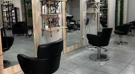 Modern salon interior at Hair by Sharon @ Boksburg, Gauteng, ZA with sleek styling chairs and mirrors.