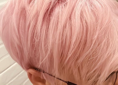 Close-up of pastel pink short hairstyle by Hair by Sharon @ Envy, Boksburg, Gauteng, ZA.