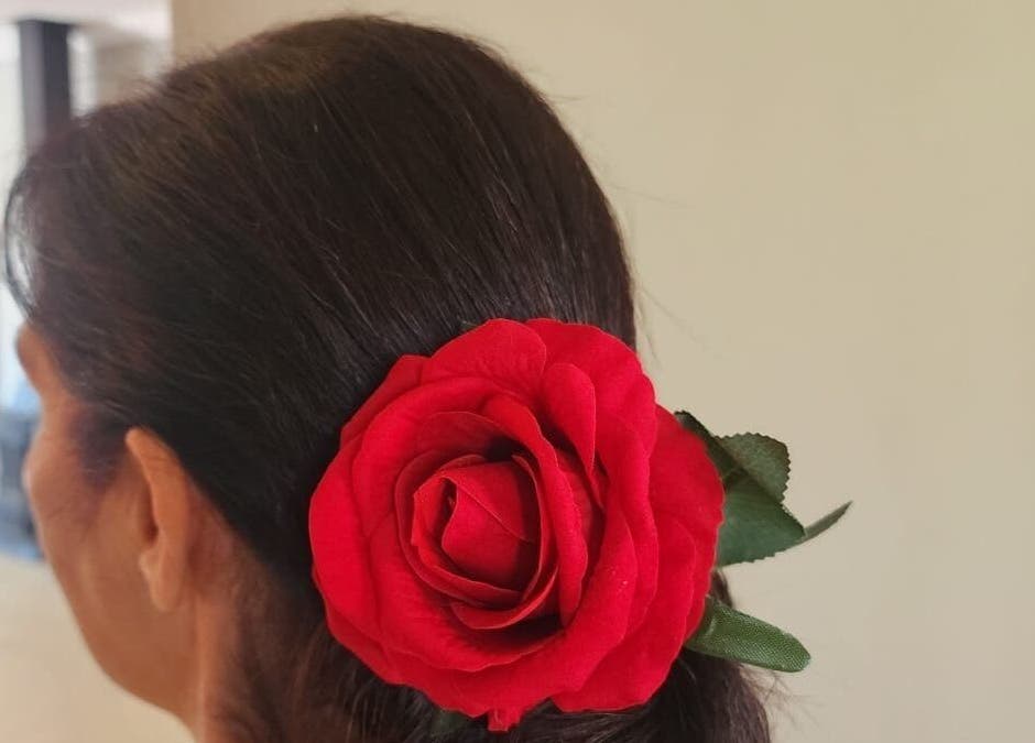 Elegant hairstyle with red rose at Hair by Sharon @ Envy, Boksburg, Gauteng, ZA.