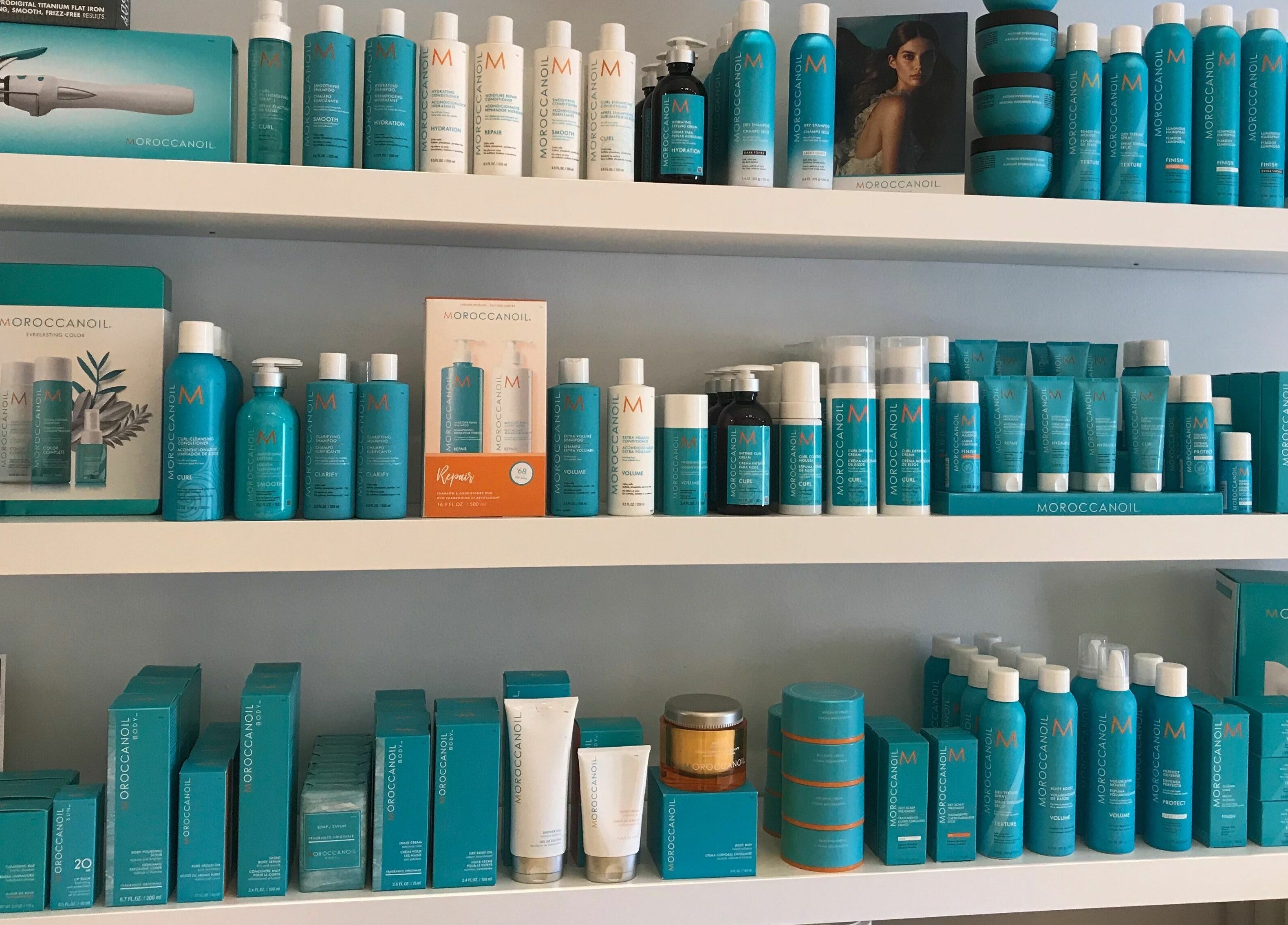 Dynamic Salon Spa Studios in Chicago, Illinois displays a diverse range of haircare products on sleek shelves.