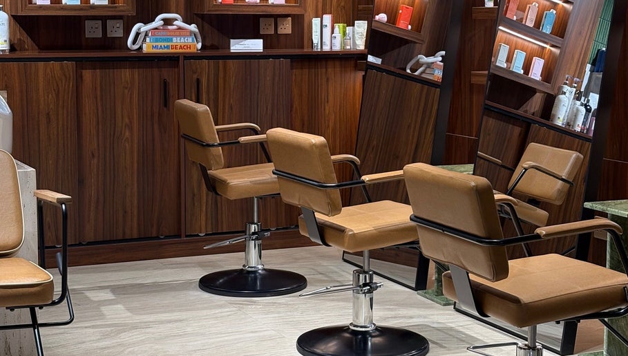 Luxurious salon styling chairs at The Beauty Loft Hair Salon and Spa in Jeddah, SA, offering a premium experience.