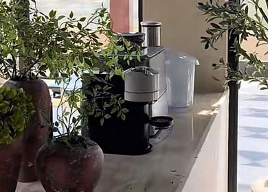 Elegant coffee station with plants at The Beauty Loft Hair Salon and Spa, Jeddah, SA.
