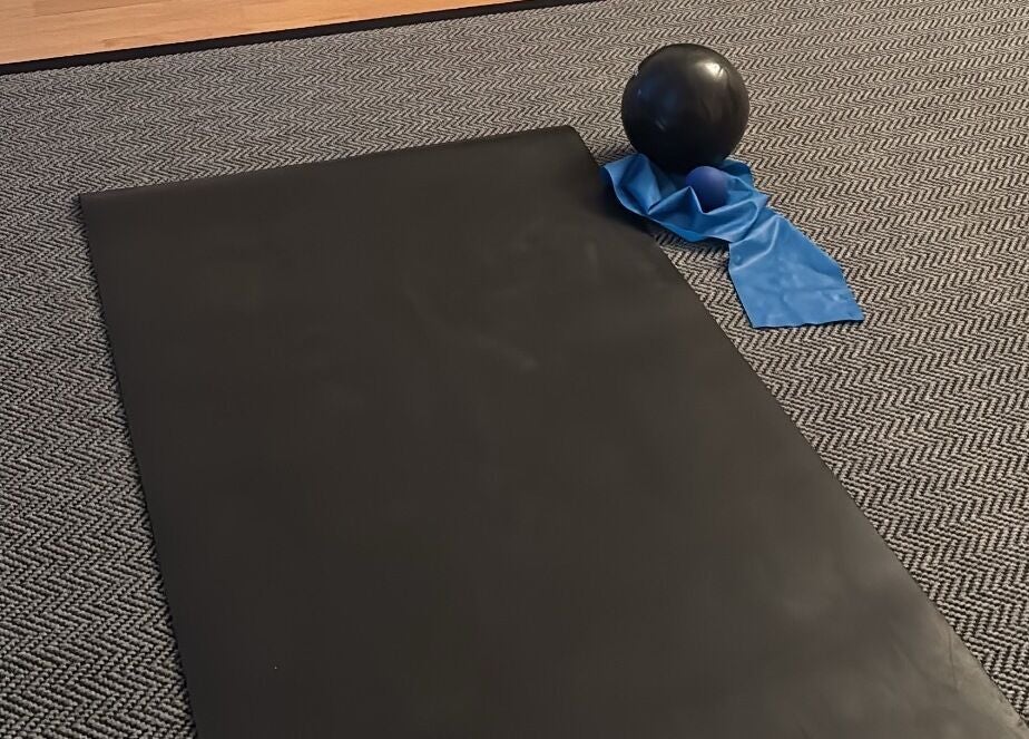 Gym mat and exercise equipment at The Recovery Room, Suton, England, GB for wellness and relaxation.