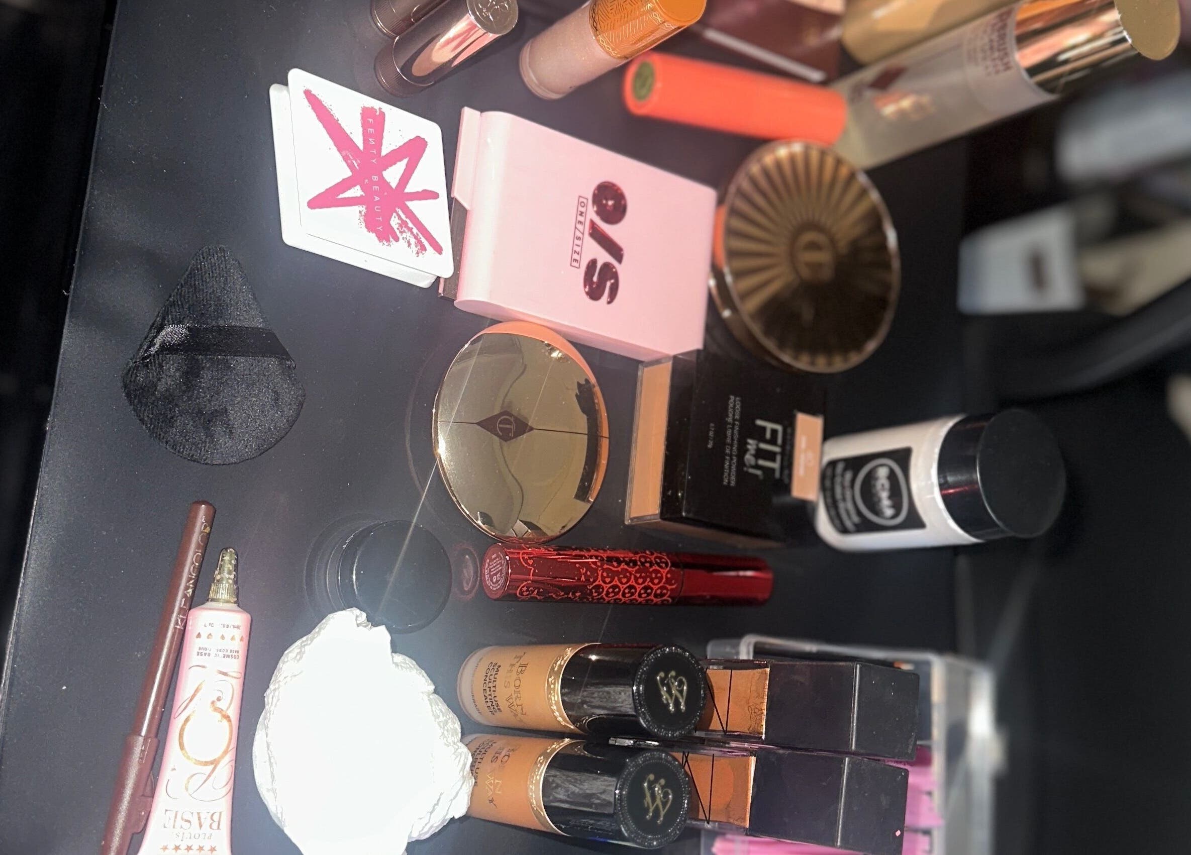 Makeup essentials displayed on a vanity at 3 Church Hill Avenue, Montego Bay, St. James, JM.