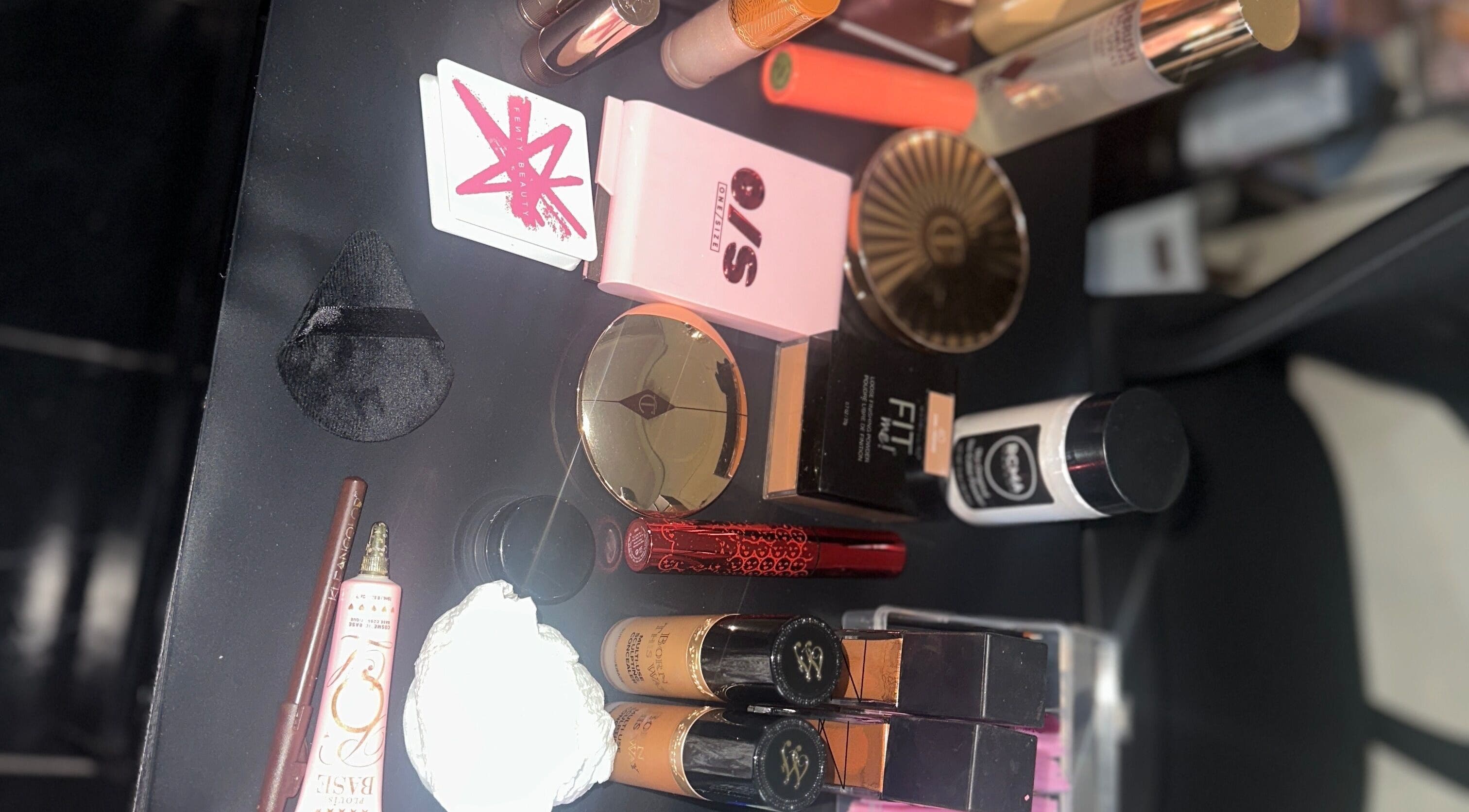 Makeup essentials displayed on a vanity at 3 Church Hill Avenue, Montego Bay, St. James, JM.