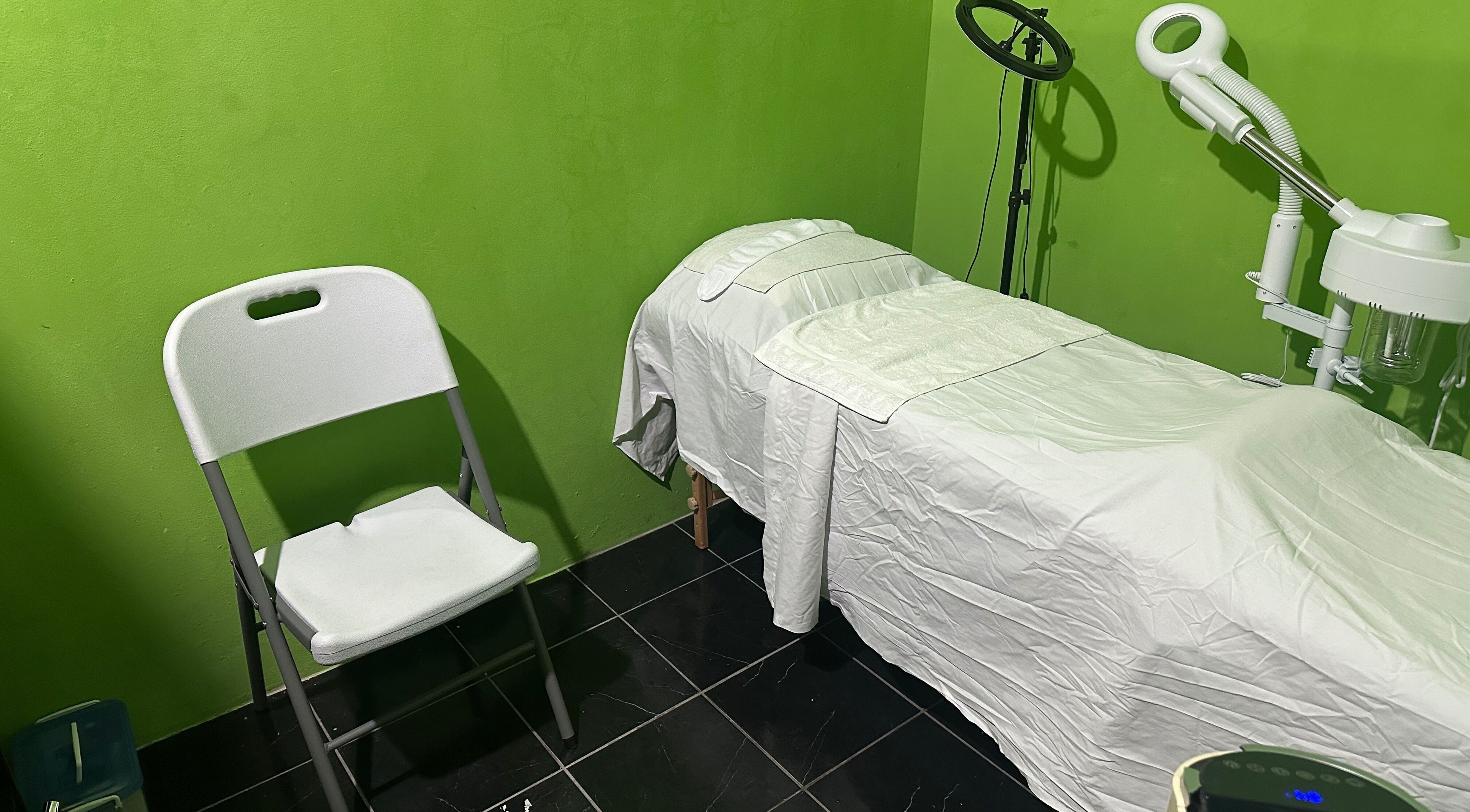 Relaxing spa room at 3 Church Hill Avenue, Montego Bay, St. James with treatment bed. Montego Bay, St. James Parish, JM.
