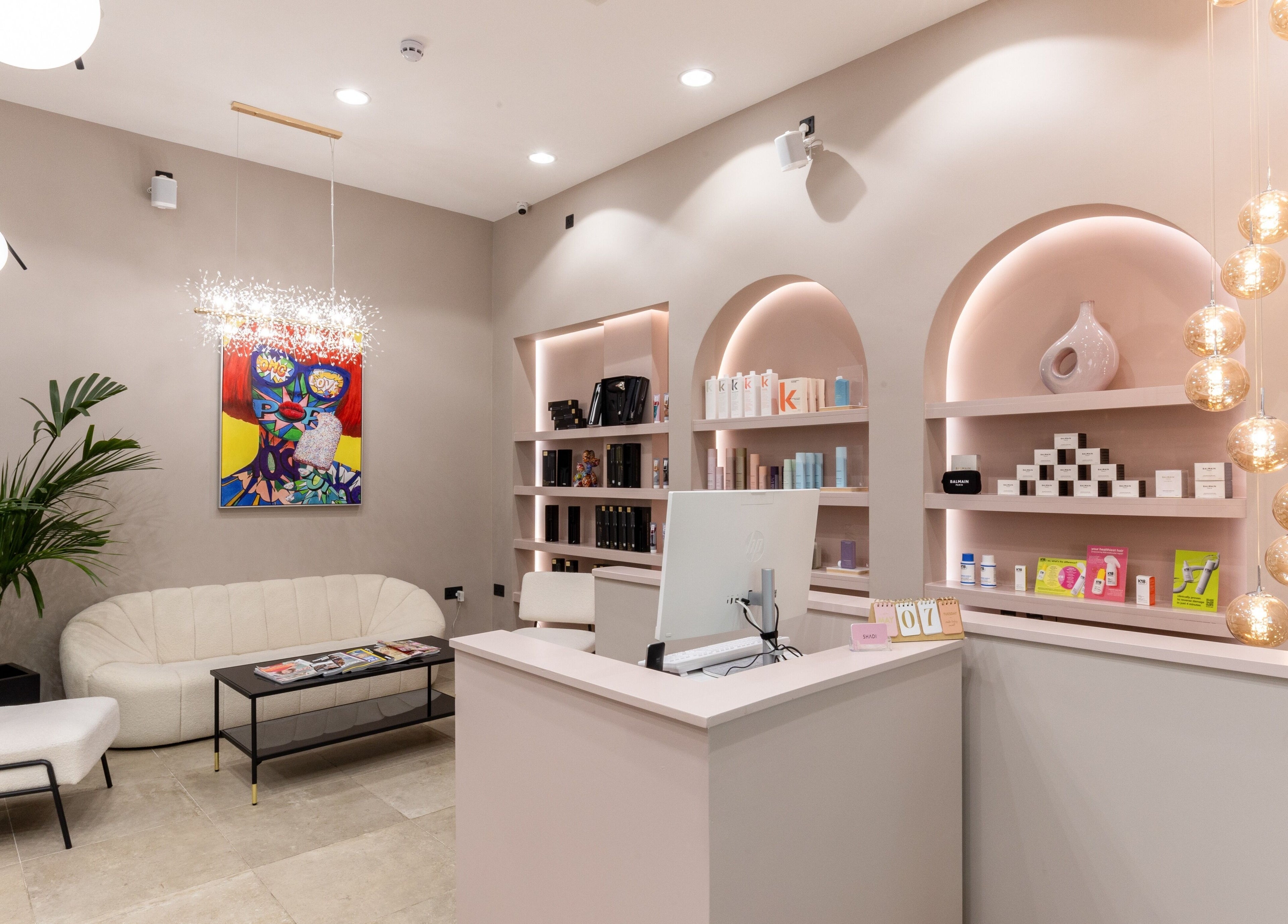 Elegant reception lounge at Shadi, London, England, GB with stylish decor and comfortable seating.