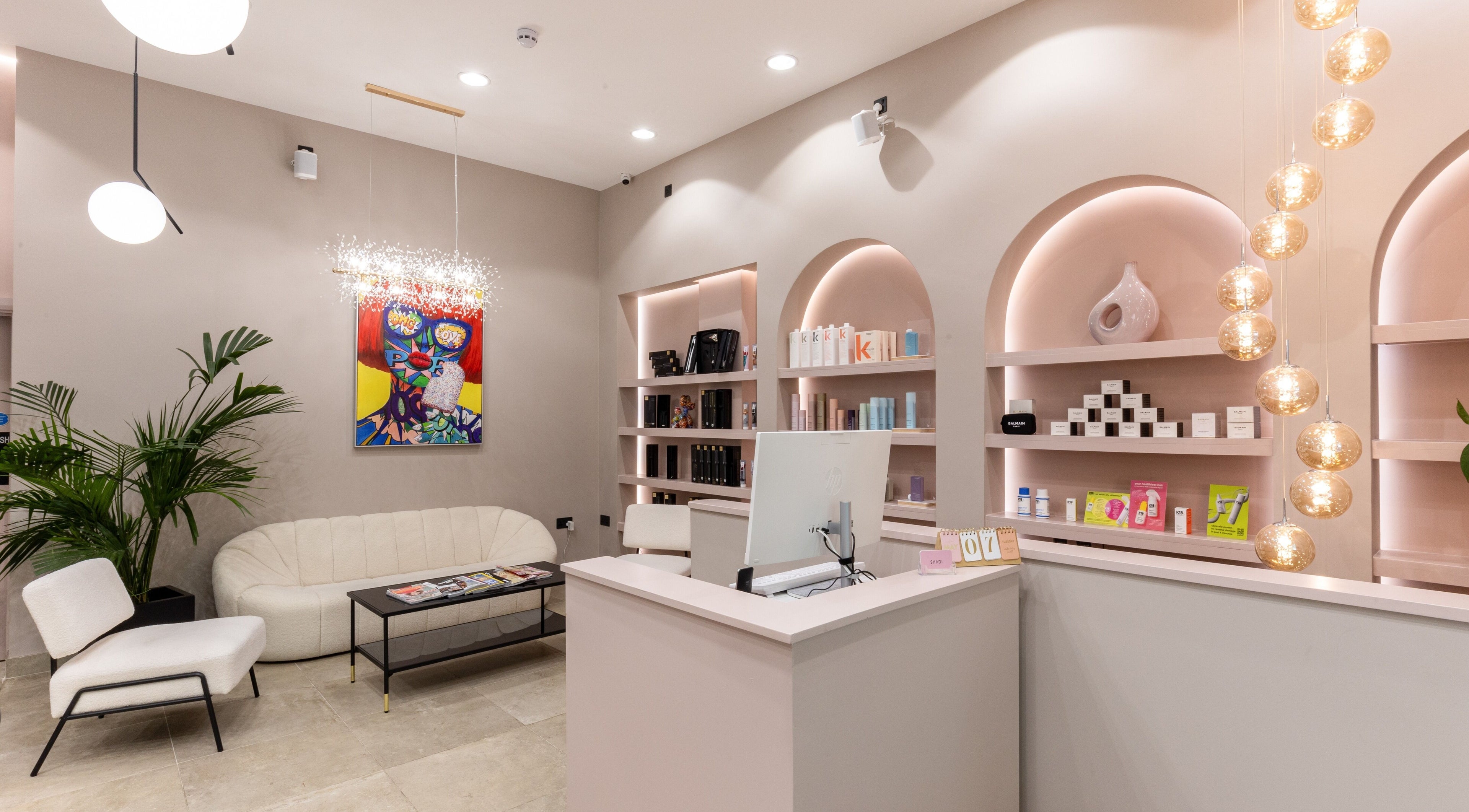 Elegant reception lounge at Shadi, London, England, GB with stylish decor and comfortable seating.