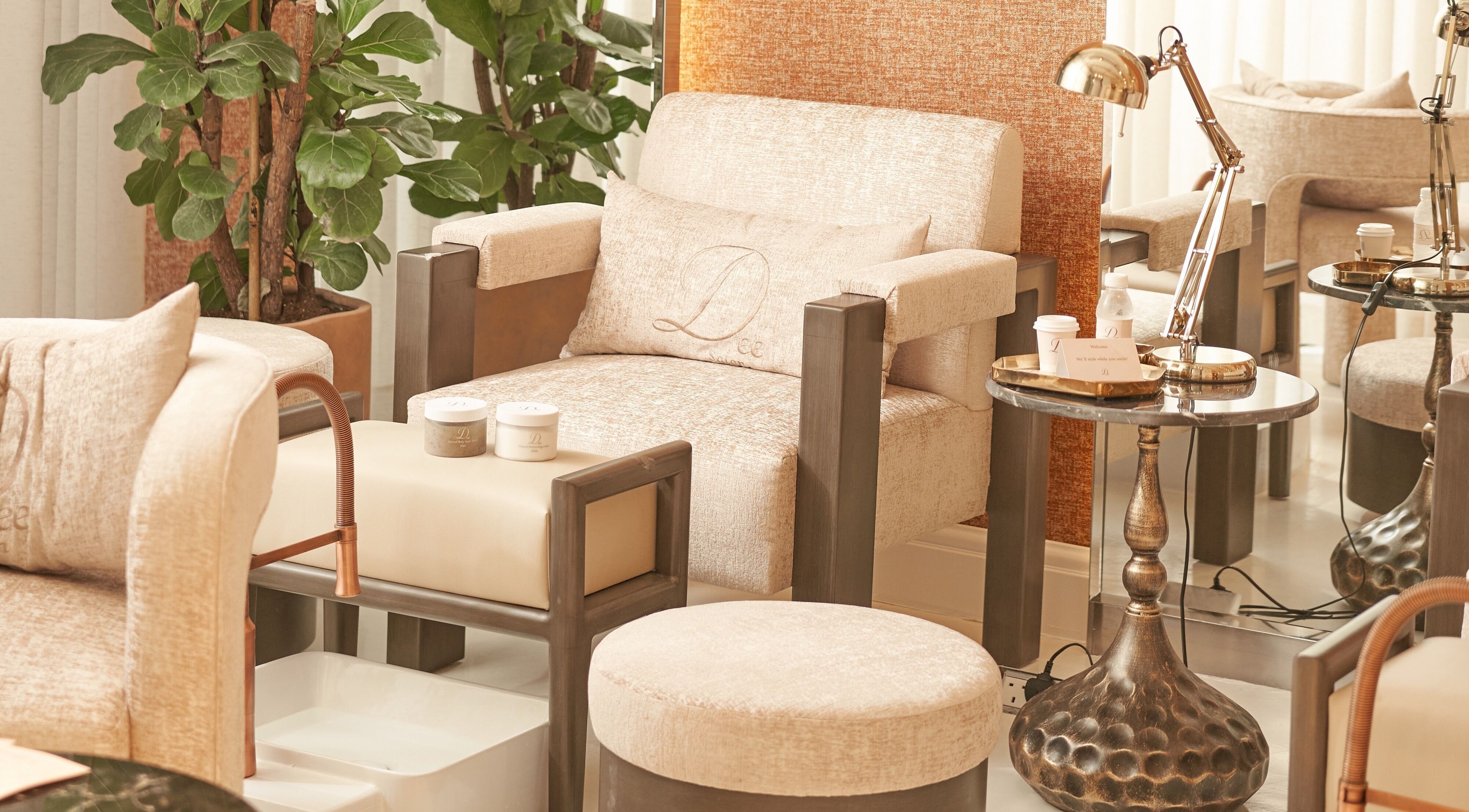 Relaxing chair setup in Dee Salon, Riyadh with modern decor and warm ambiance for wellness treatments.