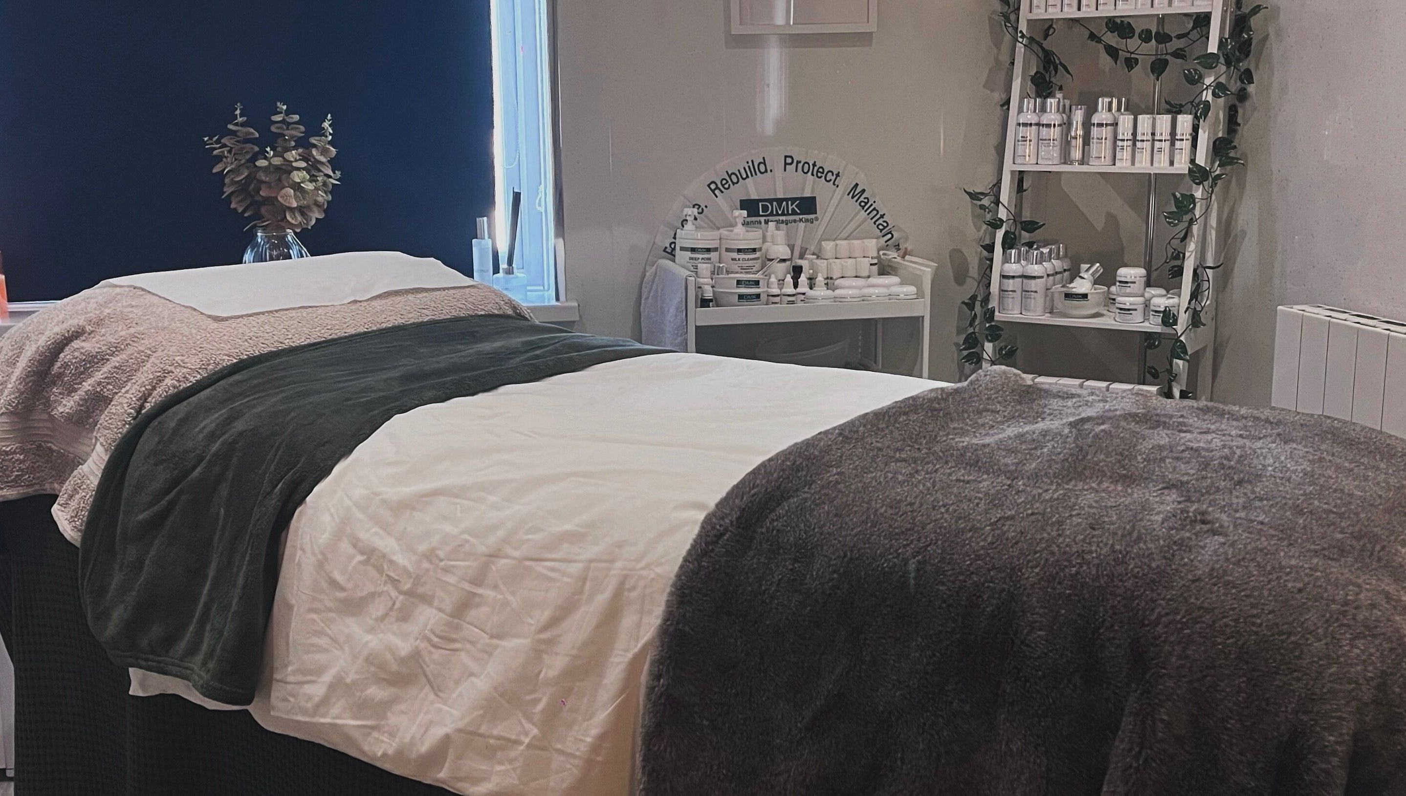 Relaxing treatment room at Beauty and Skincare by Orla, Dunmurry, Northern Ireland, GB, featuring cozy linens.