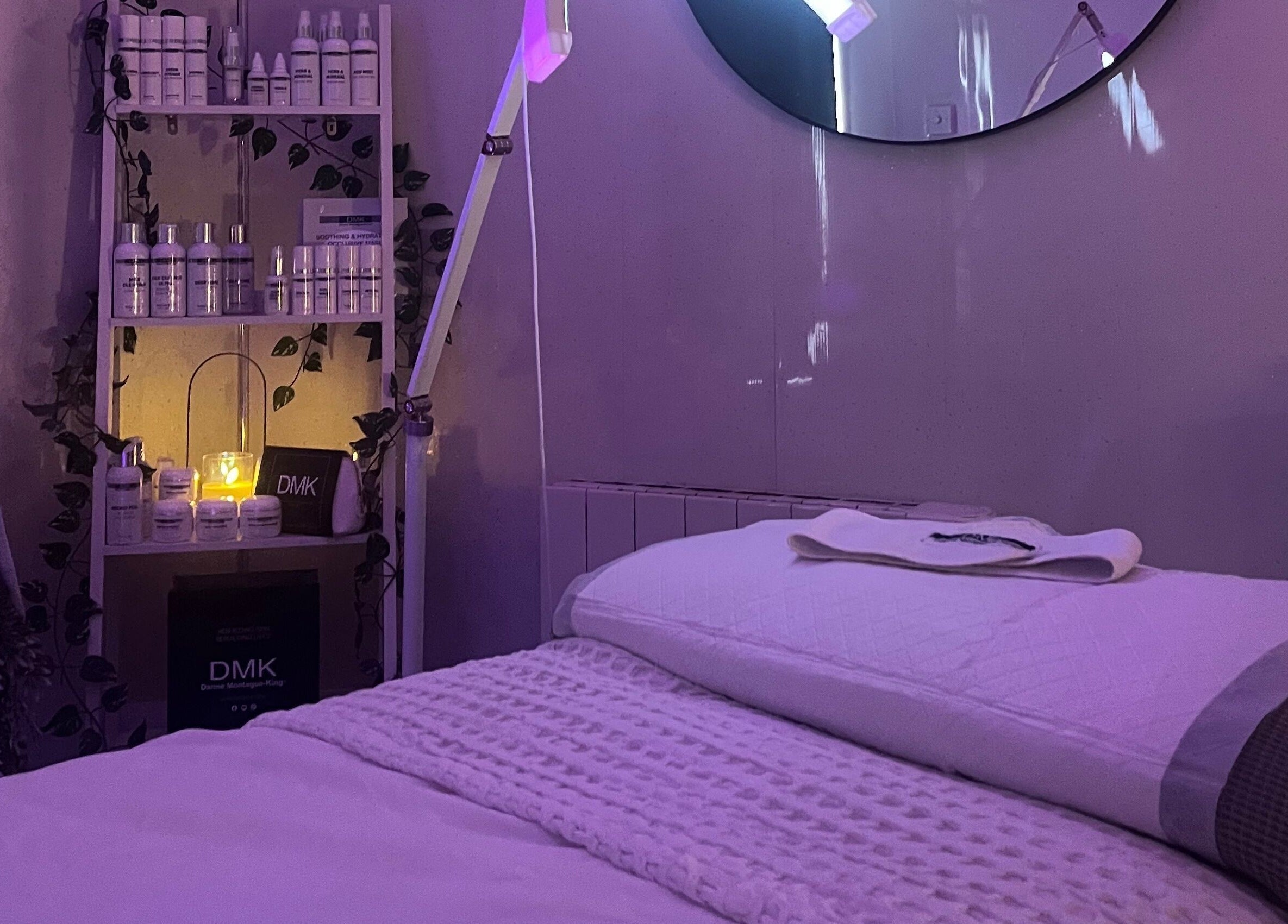 Serene treatment room at Beauty and Skincare by Orla, Dunmurry, Northern Ireland, GB with soft lighting.