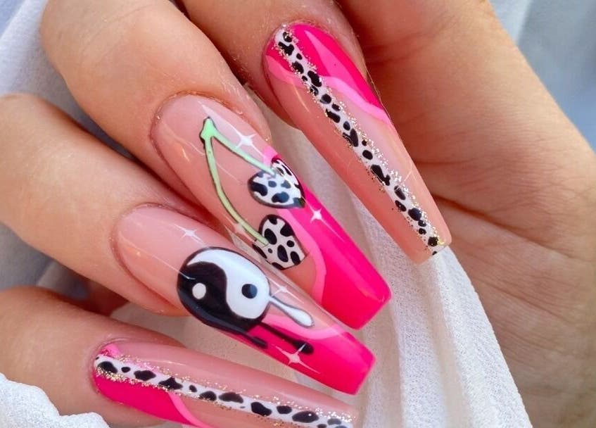 Stylish nail art with vibrant designs at Hienie's, Brentwood, England, GB, perfect for beauty enthusiasts.