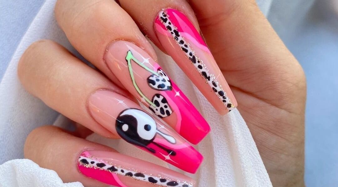 Stylish nail art with vibrant designs at Hienie's, Brentwood, England, GB, perfect for beauty enthusiasts.