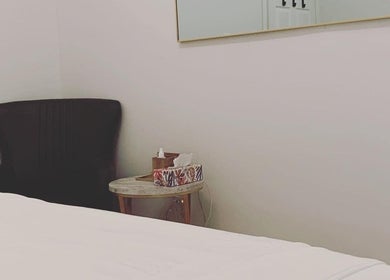 Relaxing chair and table setup in Blossom Health, Massage Therapy and Manual Osteopathy, Toronto, Ontario, CA.