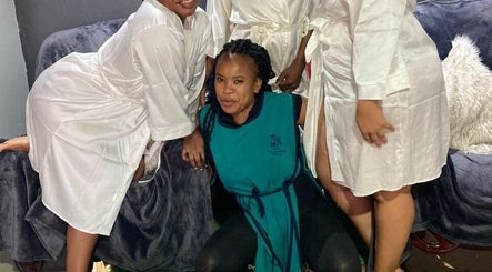 Guests wearing robes enjoying a group experience at Malindosi Spa, Roodepoort, Gauteng, ZA.