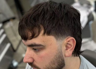 Stylish haircut at Rex's Barbershop, Auckland, Auckland, NZ, showcasing expert barber skills.