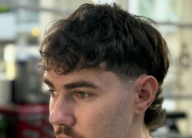Trendy mullet haircut at 9t3 Barber Studio located in Auckland, Auckland, NZ.