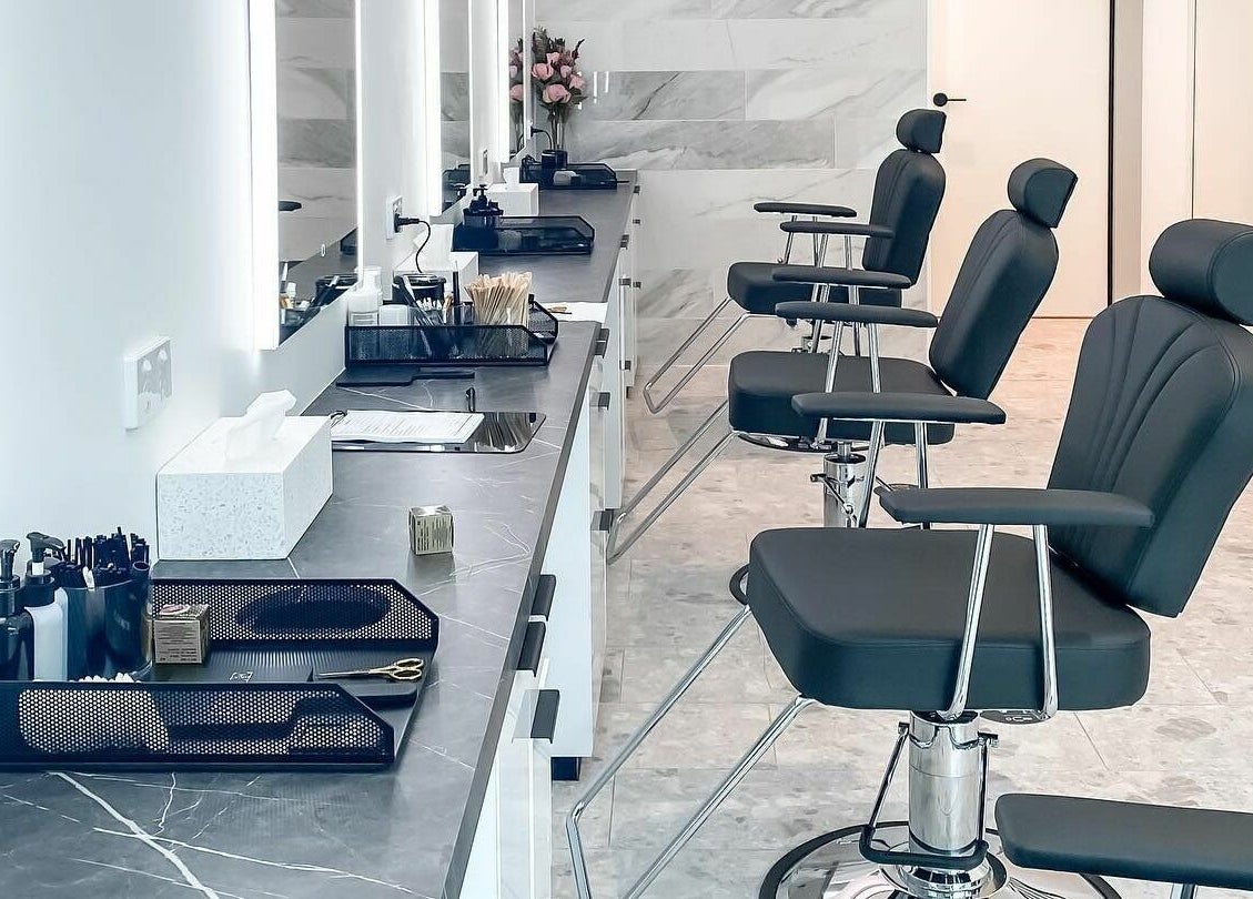 Elegant salon chairs and styling stations at Thread'In Shape - Caddens, Caddens, New South Wales, AU.