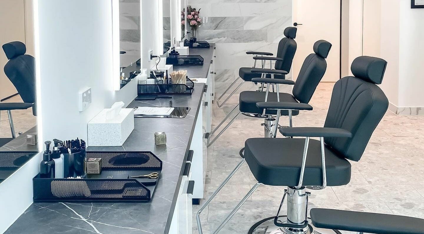 Elegant salon chairs and styling stations at Thread'In Shape - Caddens, Caddens, New South Wales, AU.