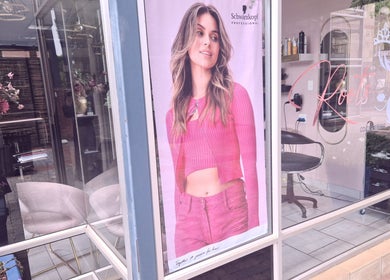 Roots Color Studio Haar salon entrance with modern poster in Bloemfontein, Free State, ZA.