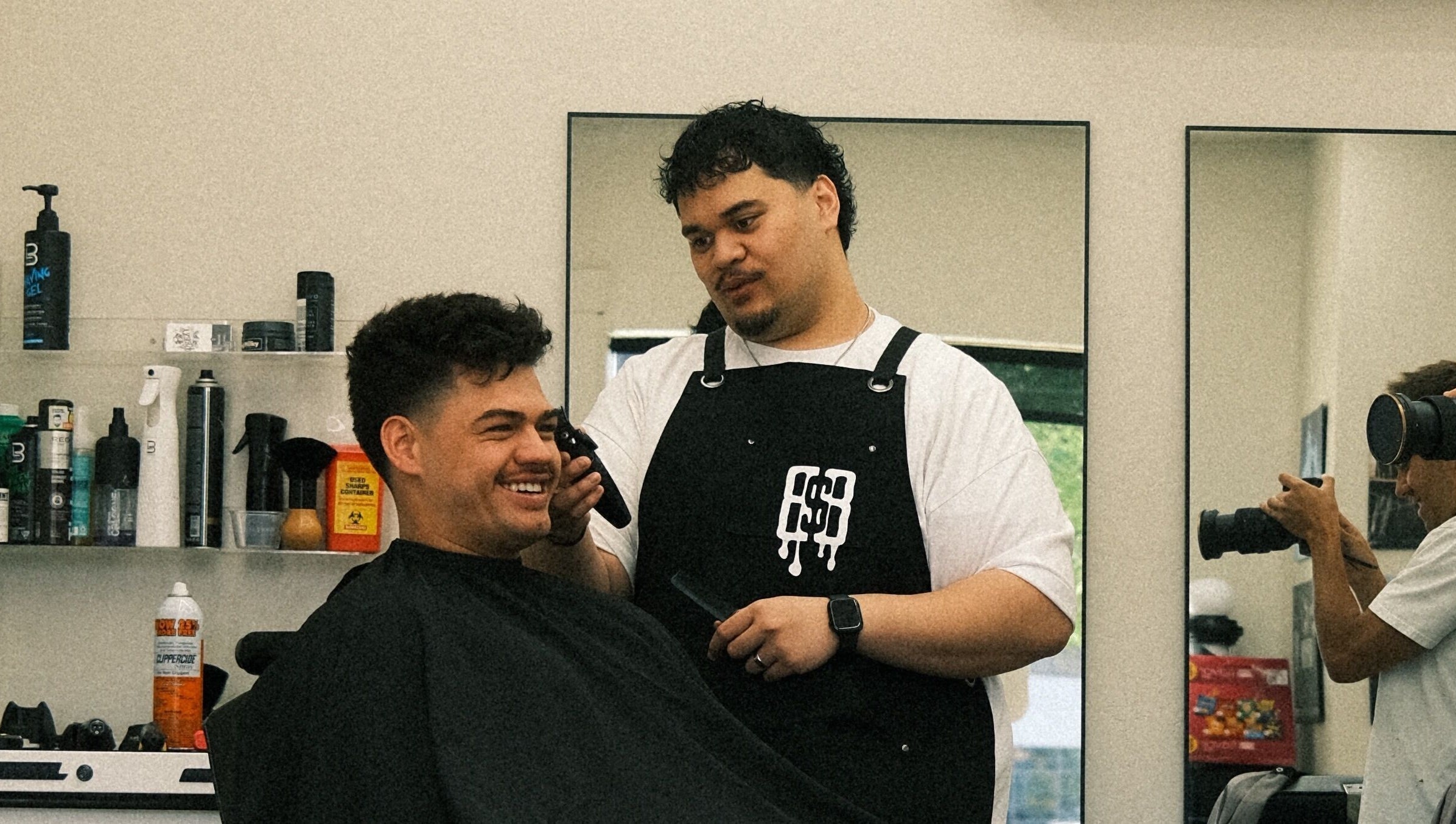 Barber styling client at Reezy at Blurry Boy$ Club, Pleasant Grove, Utah, US.