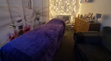 Relaxing spa room at Beautylicious, Poole, England, GB, featuring a plush table and calming decor.