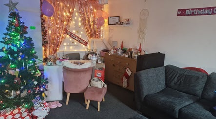 Beautylicious in Poole, England, GB, beautifully decorated for a festive celebration with lights and ornaments.