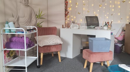 Beautylicious nail and beauty treatment area with plush seating and decor in Poole, England, GB.