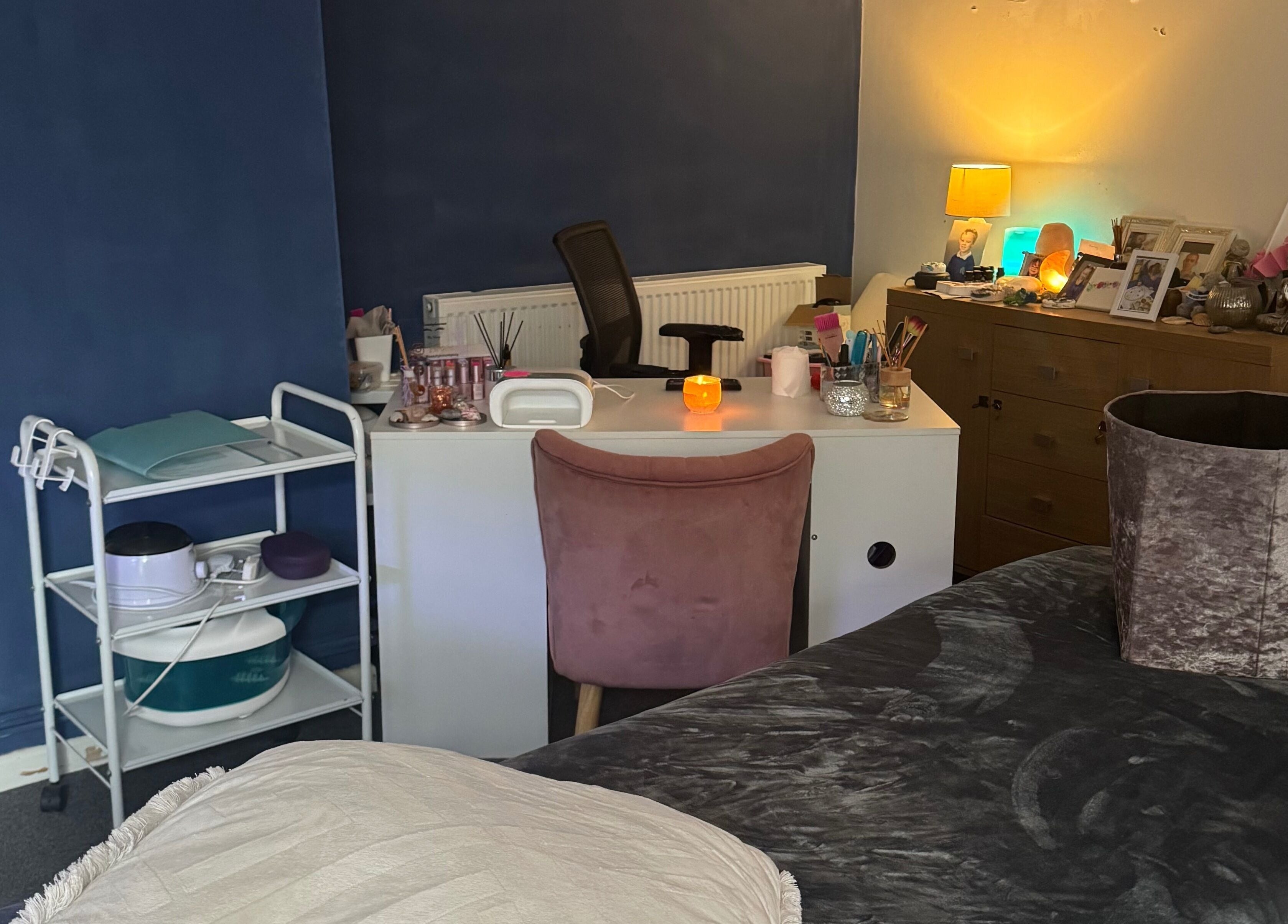 Cozy beauty treatment room at Beautylicious in Poole, England, GB with a warm ambiance and essential tools.