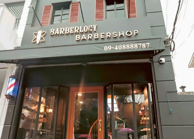 Front view of Barberlogy Barbershop - Shinsawpu, located in Yangon, Yangon, MM, showcasing a modern exterior.