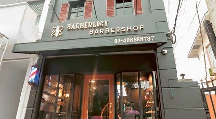 Front view of Barberlogy Barbershop - Shinsawpu, located in Yangon, Yangon, MM, showcasing a modern exterior.