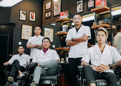 Barberlogy Barbershop - Shinsawpu team in Yangon, MM offering premium barber services in a stylish setting.
