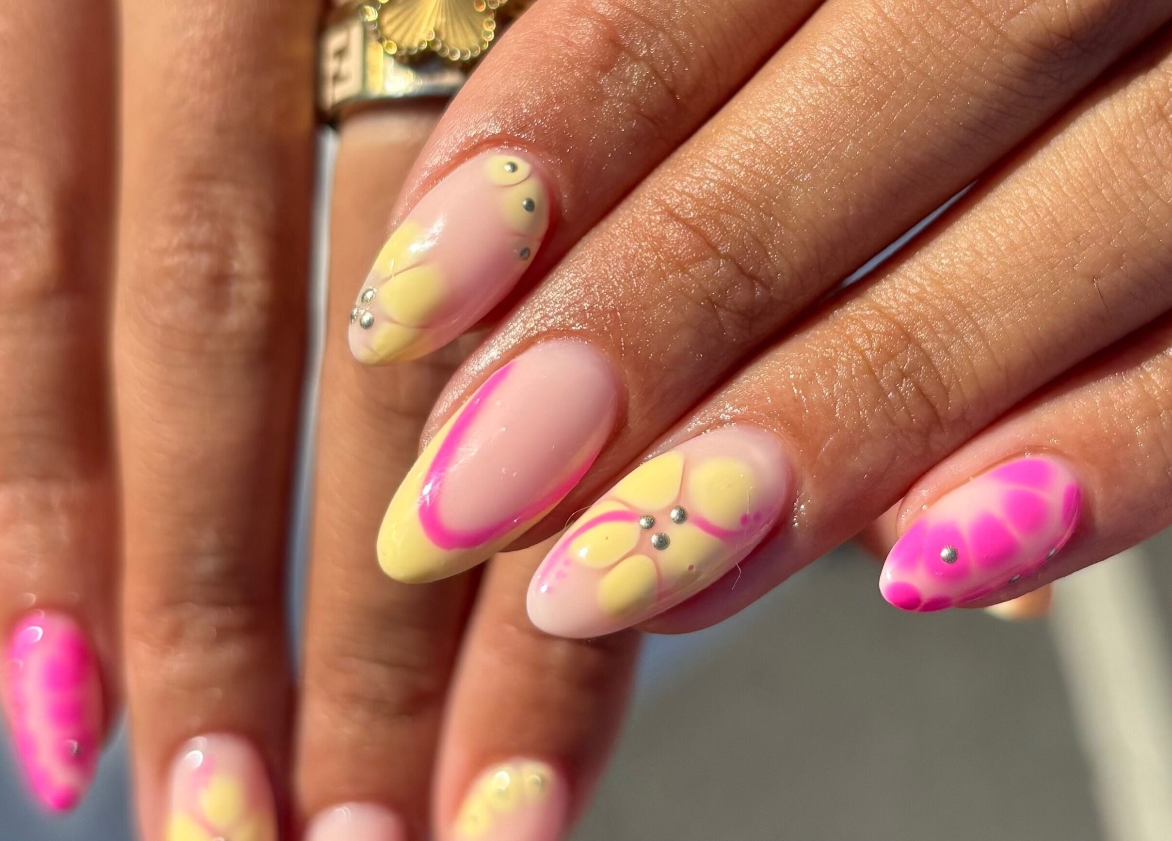 Vibrant neon nail art design at Gels by Renata in Middlesbrough, England, GB showcasing intricate detail.