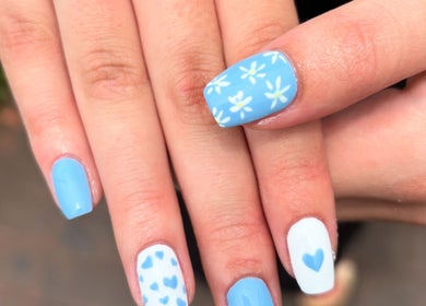 Elegant blue and white floral nail art at Nails by Shanté, Pretoria, Gauteng, ZA.