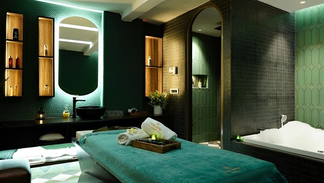 Luxurious treatment room at Thalasso Spa (Vasant Vihar), New Delhi, Delhi, IN, featuring a massage table and tub.