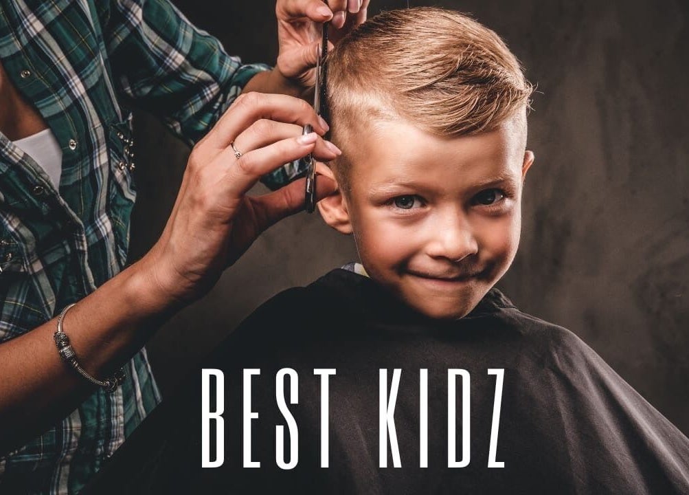 Child enjoying a haircut at Kids Best UAE, Dubai, Dubai, AE.