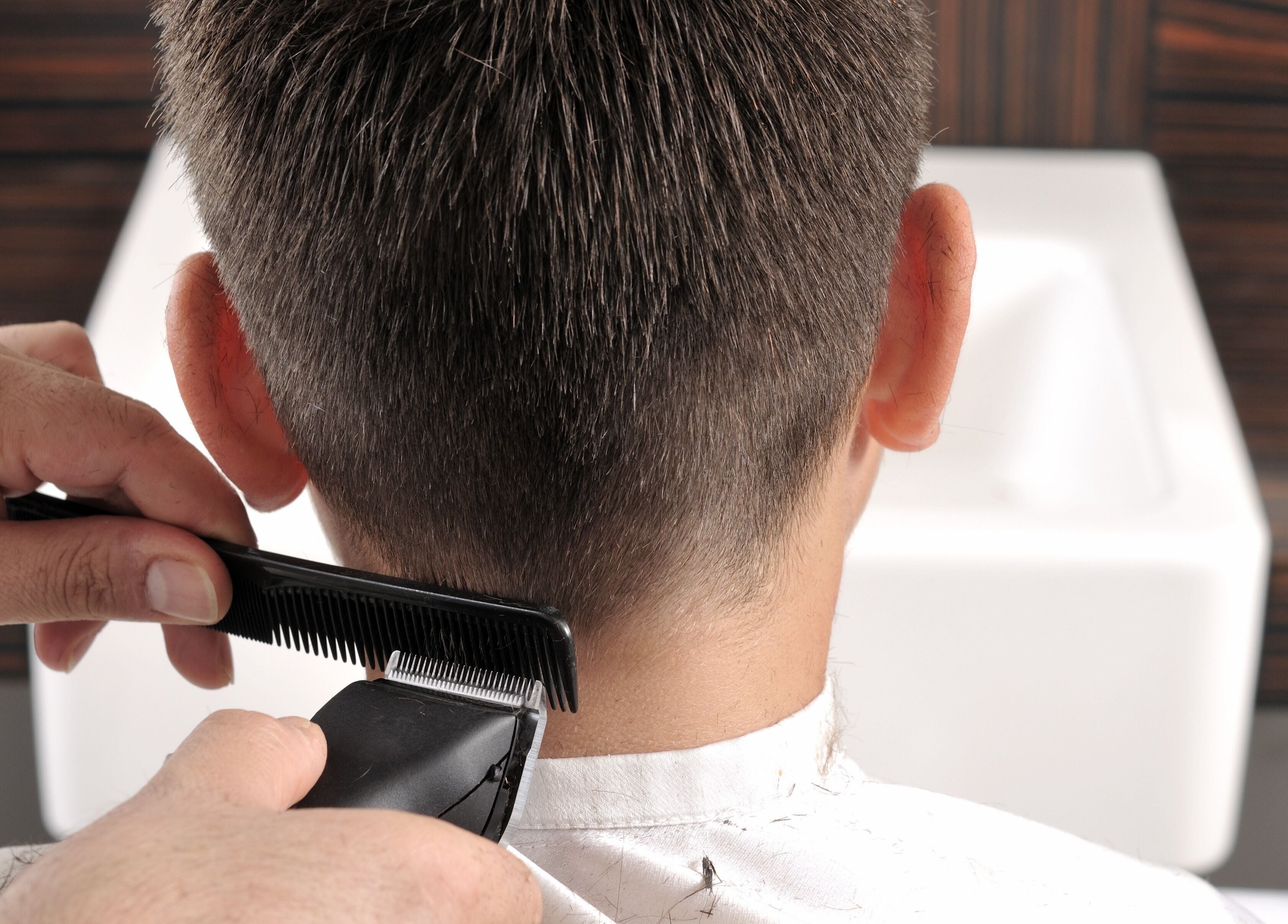 Child getting a haircut at Kids Best UAE, Dubai, Dubai, AE. Professional barber service.