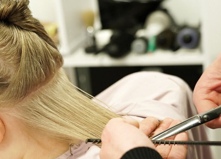 Professional haircut service at Kids Best UAE, Dubai, Dubai, AE, highlighting expert hair styling.