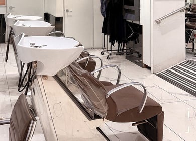 Modern salon wash stations at Bleu Ciel, New York, New York, US offering luxury hair care services.
