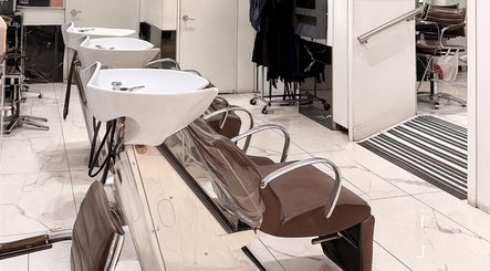 Modern salon wash stations at Bleu Ciel, New York, New York, US offering luxury hair care services.