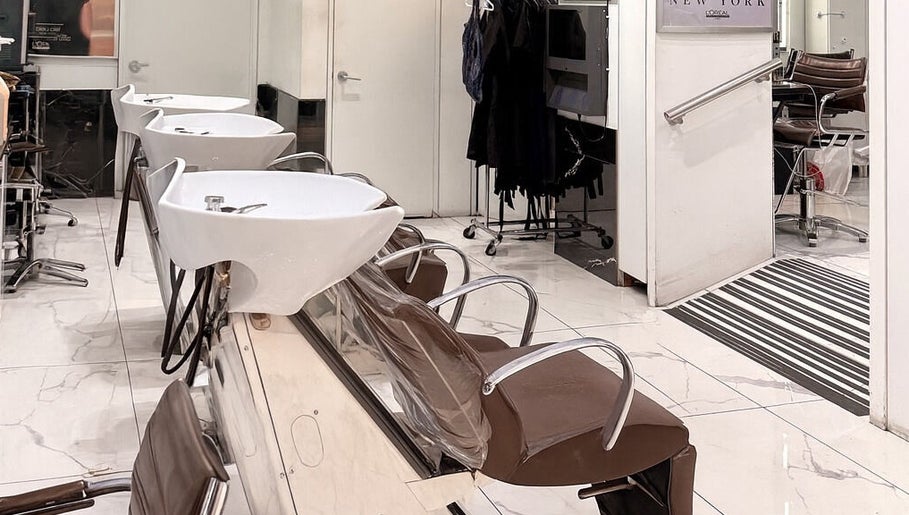 Stylish wash stations at Bleu Ciel hair salon, offering luxury in New York, New York, US.
