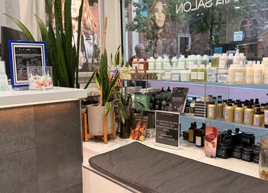 Chic product display at Bleu Ciel hair salon in New York, New York, US, featuring premium haircare items.