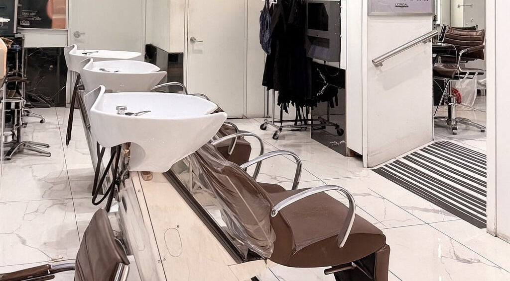 Modern wash stations at Bleu Ciel Hair Salon in New York, NY, US, showcasing sleek design and comfort.