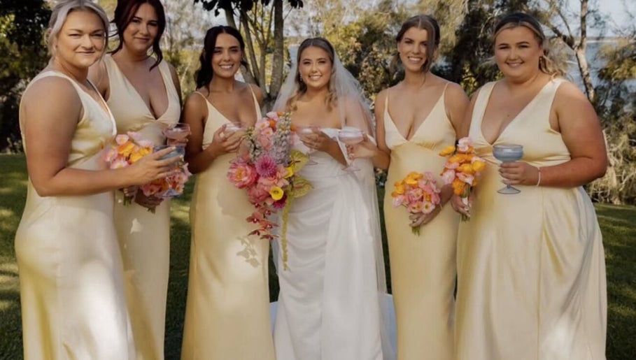 Bridal party at Beachbums Tanning & Hair Bribie in Bongaree, Queensland, AU with stunning floral bouquets.