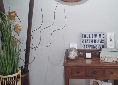 Cozy decor at Beachbums Tanning & Hair Bribie in Bongaree, Queensland, AU featuring natural elements.