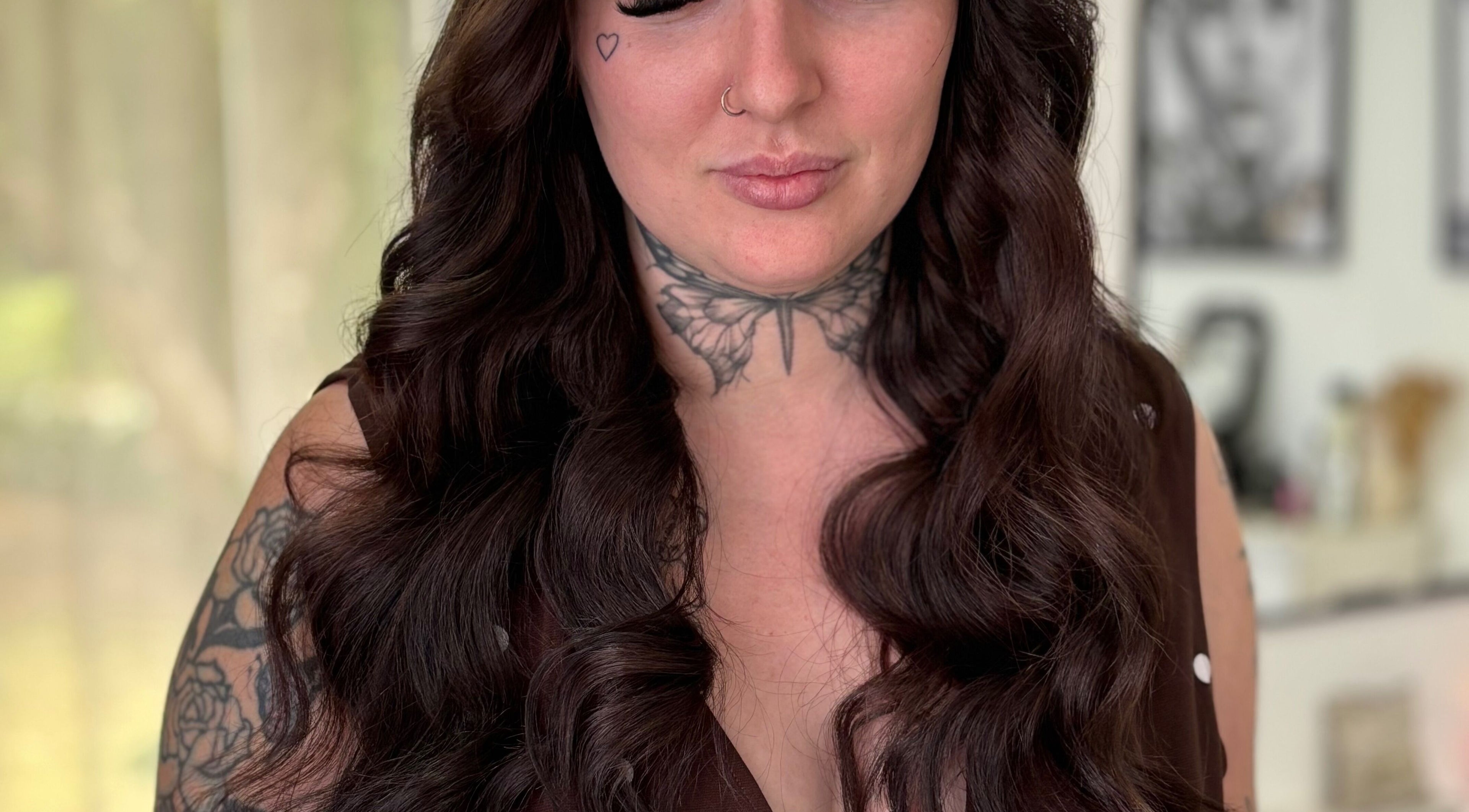 Brunette with long wavy hair styled at Deluxe Lash & Locks, West Wodonga, Victoria, AU.