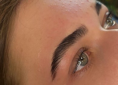 Close-up of expertly shaped eyebrows at Cute But Deadly nail co. Bathgate, Scotland, GB.