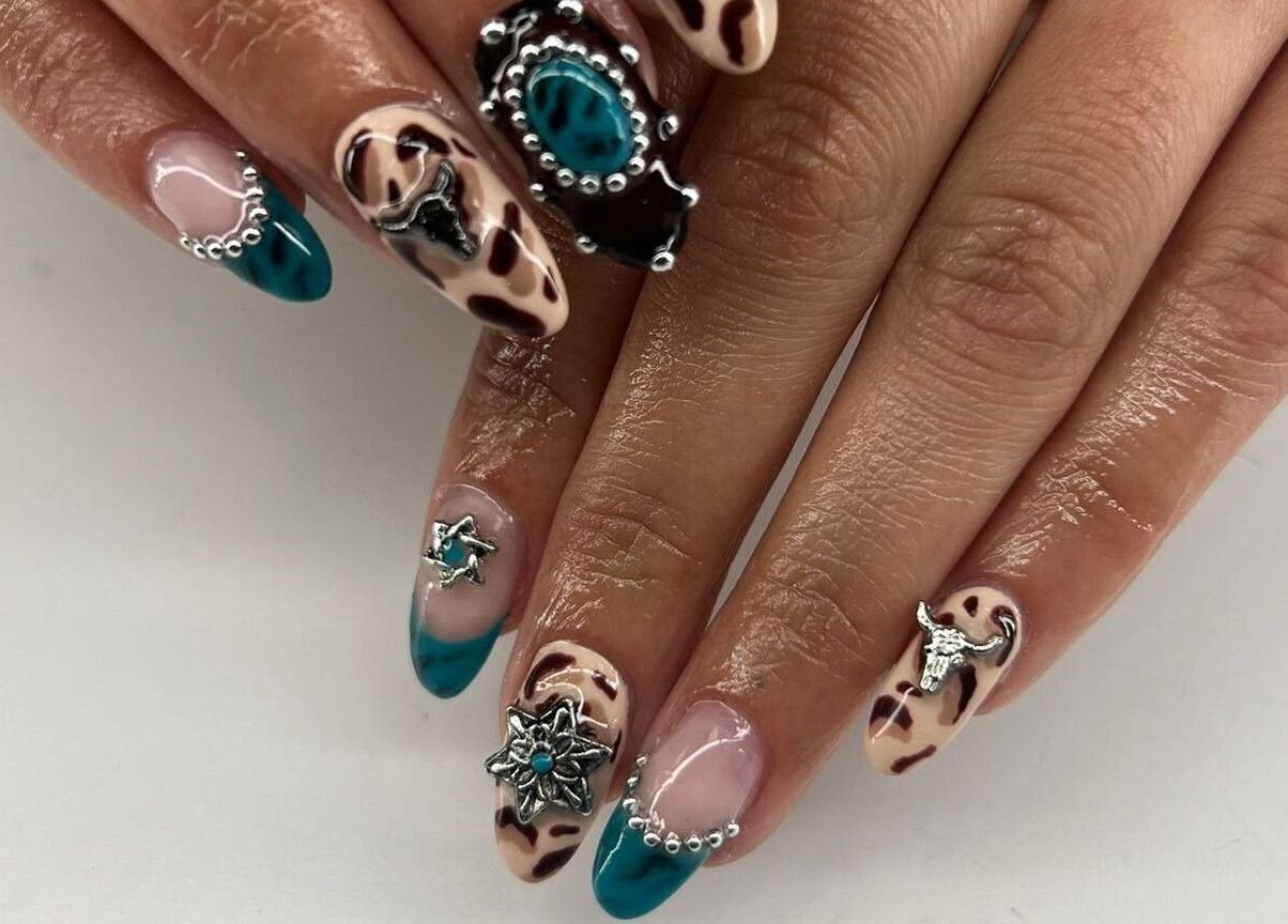 Detailed nail art with turquoise and animal print at Cute But Deadly nail co. Bathgate, Scotland, GB.