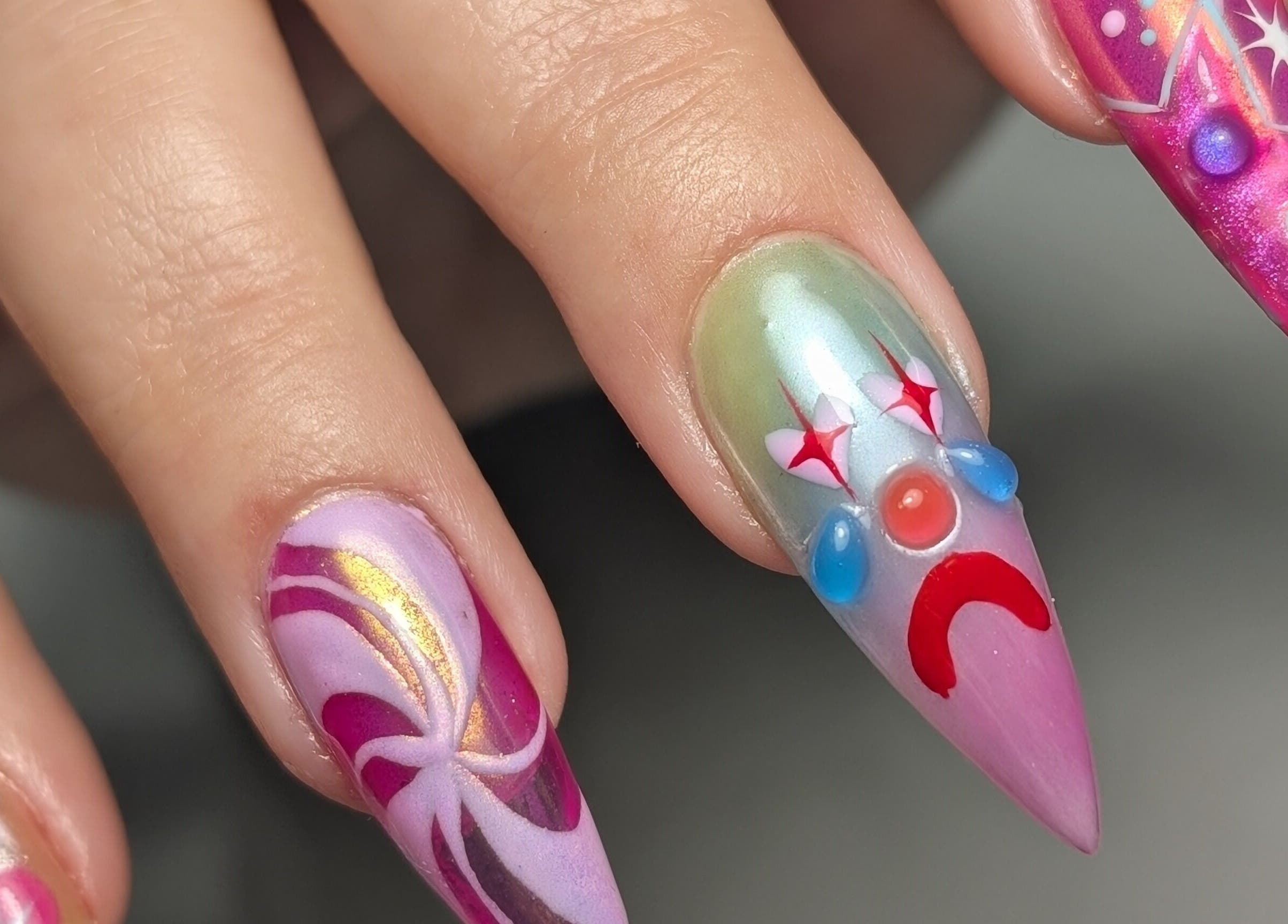 Colorful nail art design from Cute But Deadly nail co. Bathgate, Bathgate, Scotland, GB showcasing detailed artistry.